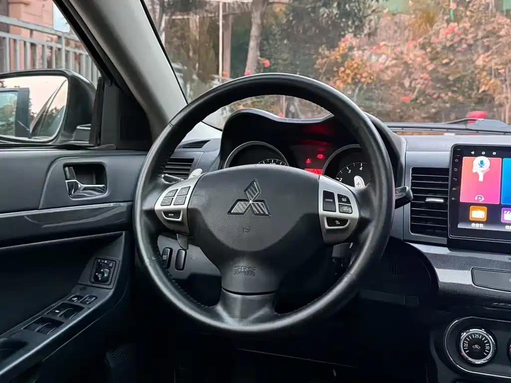 Mitsubishi Lancer EX 2013 — фото 4