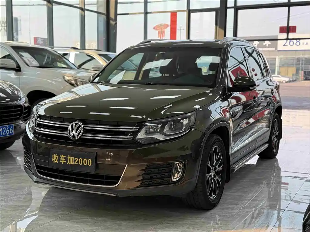 Volkswagen Tiguan 2014 — фото 2