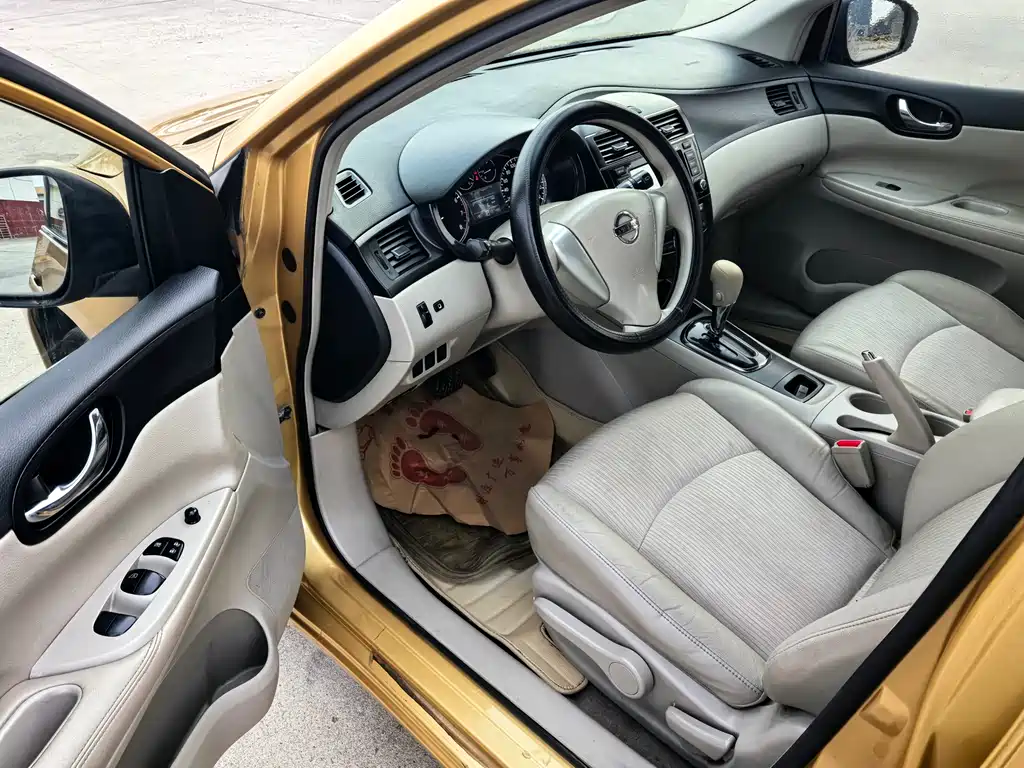 Nissan Tiida 2015 — фото 10