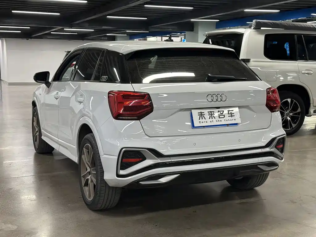 Audi Q2L 2022 — фото 10