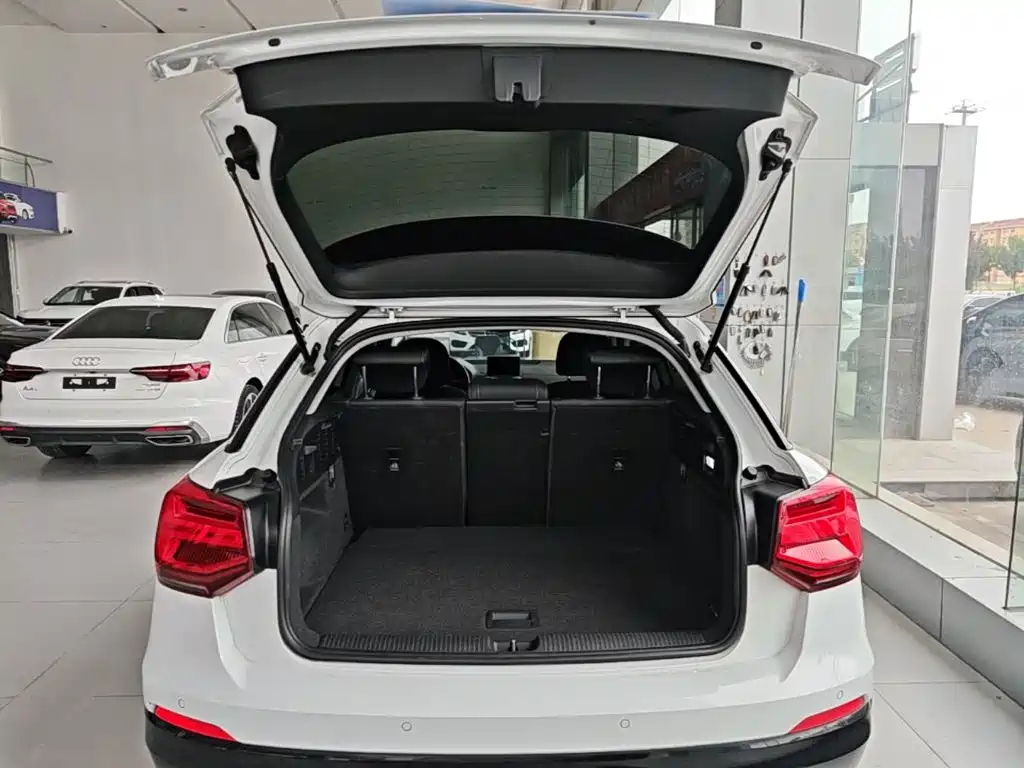 Audi Q2L 2021 — фото 19