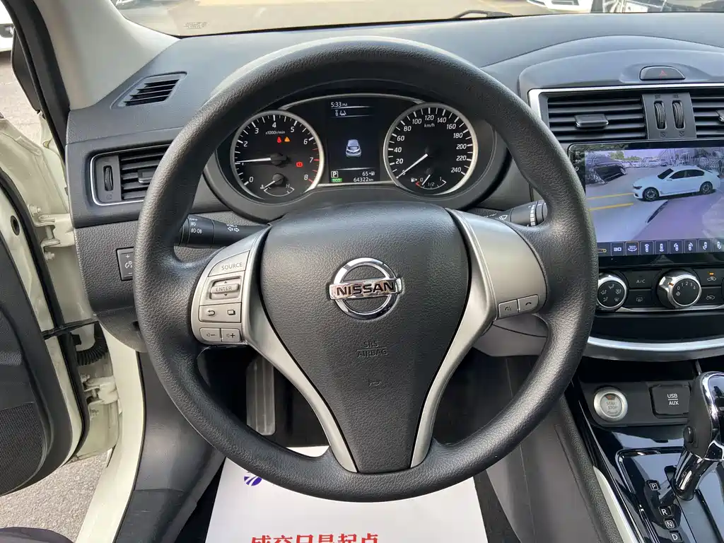 Nissan Tiida 2017 — фото 12