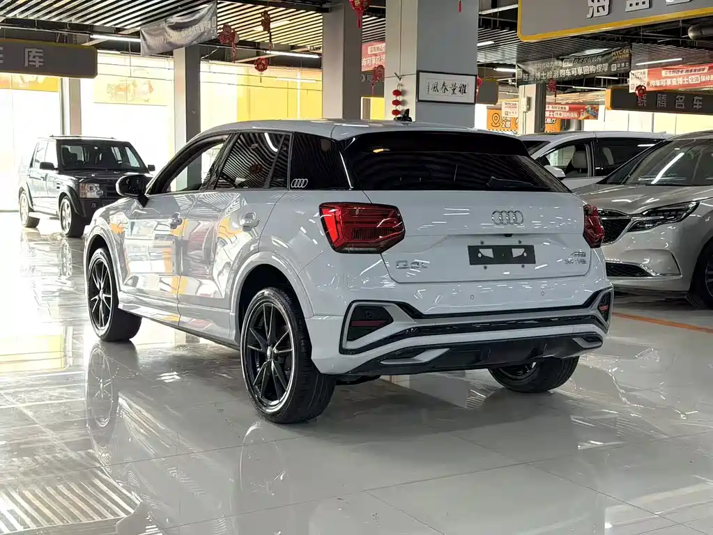 Audi Q2L 2023 — фото 11