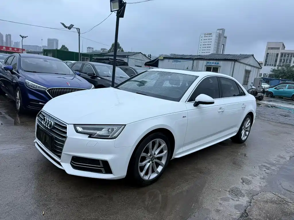 Audi A4L 2018 — фото 1