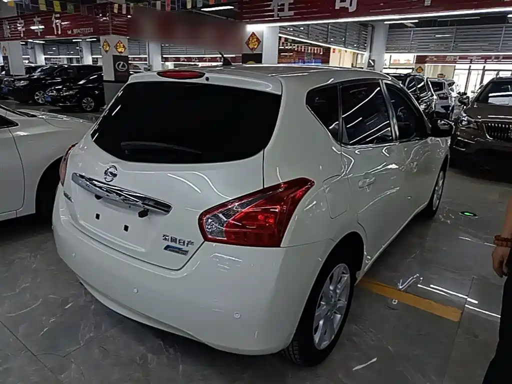 Nissan Tiida 2015 — фото 7