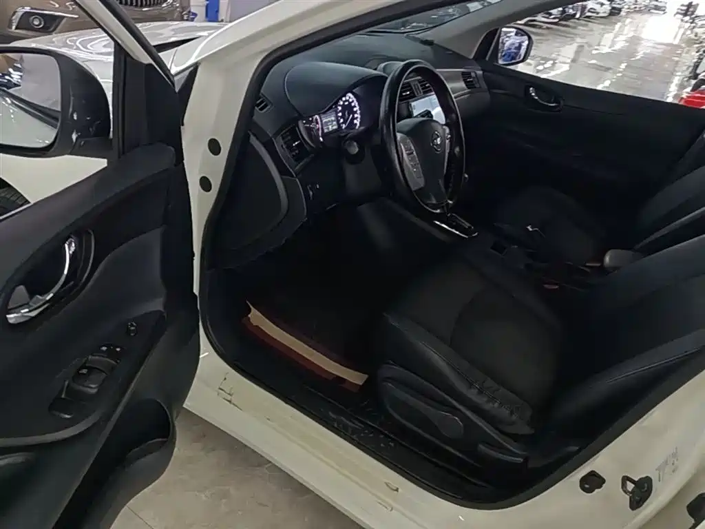 Nissan Tiida 2015 — фото 16