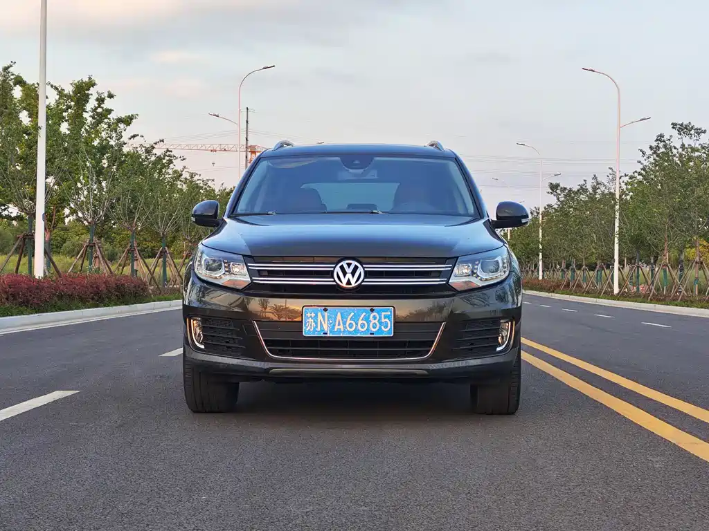 Volkswagen Tiguan 2013 — фото 2