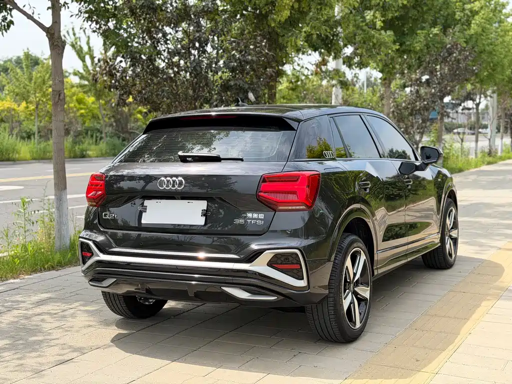 Audi Q2L 2022 — фото 22