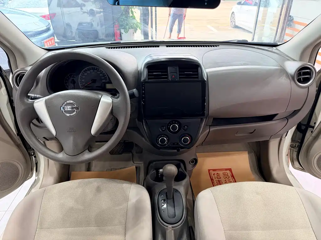Nissan Sunny 2016 — фото 11
