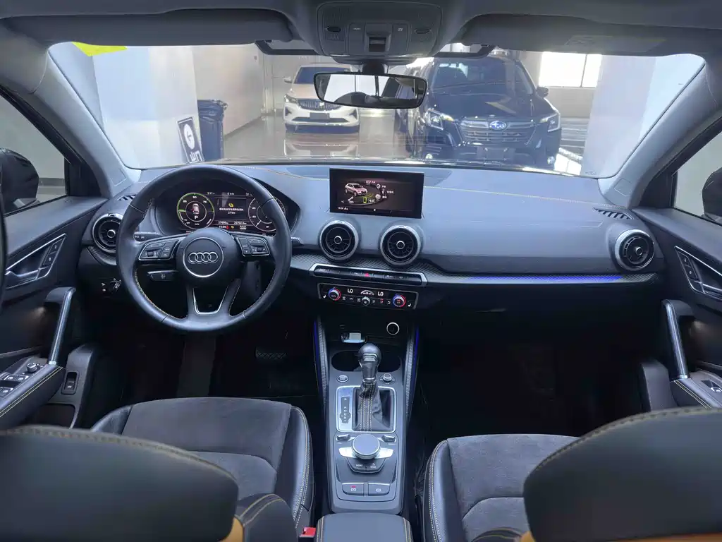 Audi Q2L E-Tron 2023 — фото 20