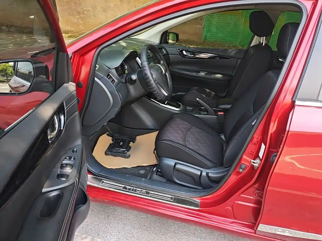 Nissan Tiida 2018 — фото 16