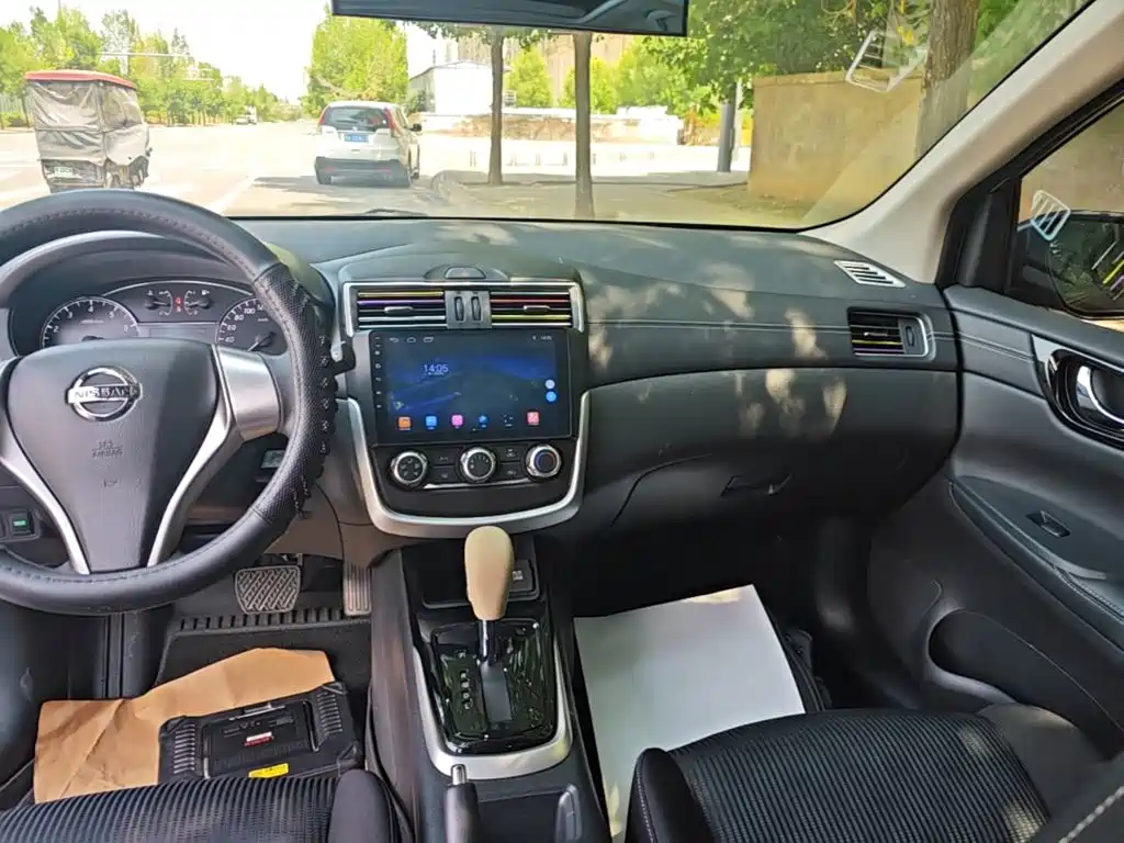 Nissan Tiida 2018 — фото 13