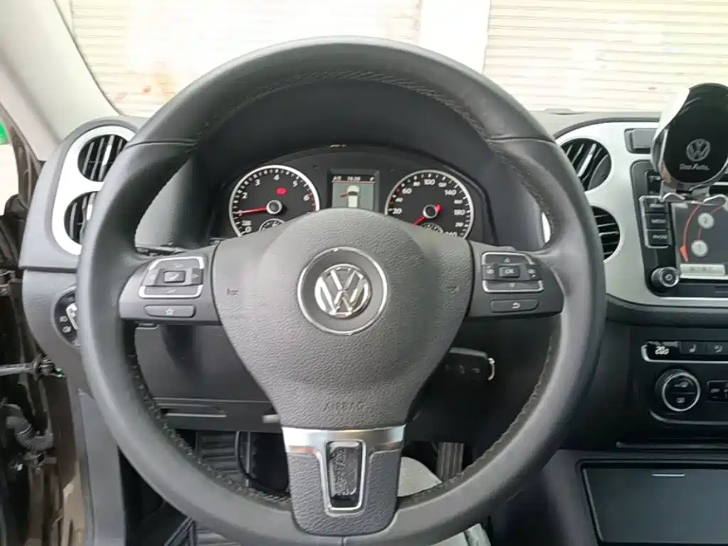 Volkswagen Tiguan 2014 — фото 11