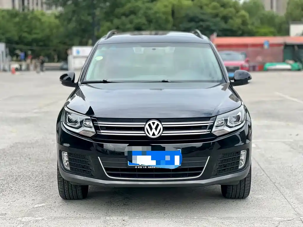 Volkswagen Tiguan 2014 — фото 2