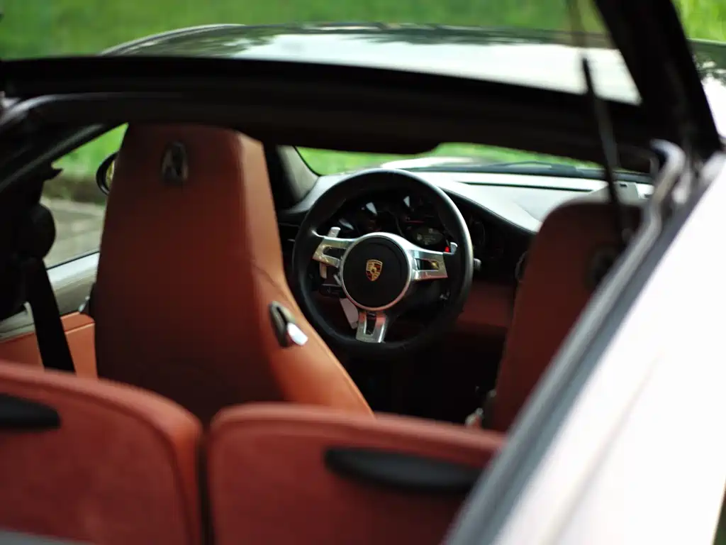 Porsche 911 2010 — фото 10