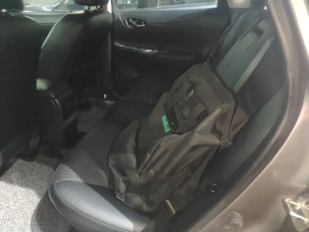 Nissan Tiida 2015 — фото 17