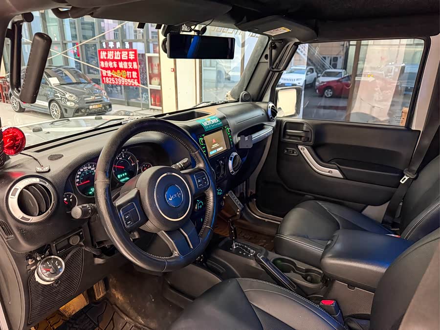 Jeep Wrangler 2014 — фото 17