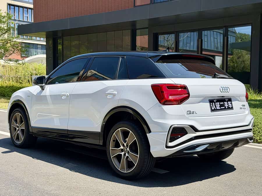 Audi Q2L 2022 — фото 21