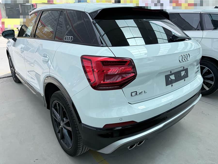 Audi Q2L 2021 — фото 17