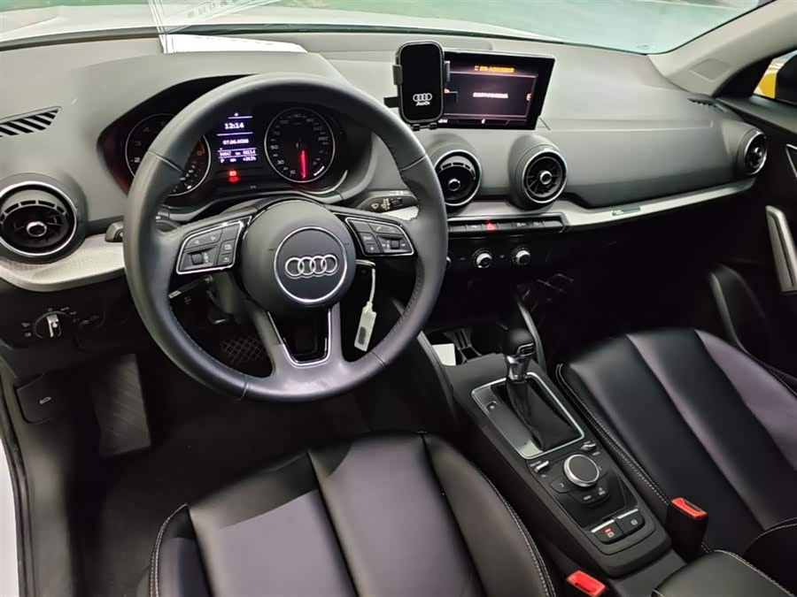 Audi Q2L 2021 — фото 10